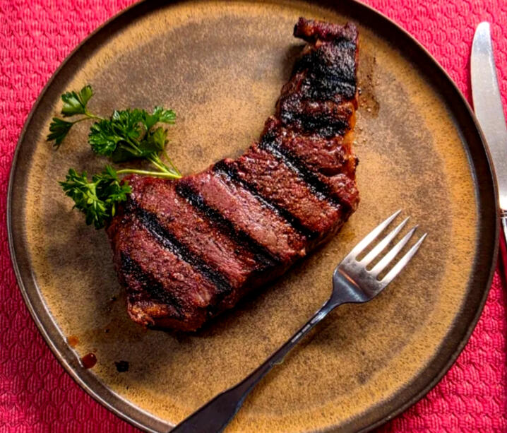 A Meadow Mist New York strip steak, fresh off the grill.